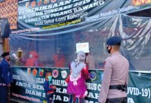 Kompi 3 B Pelopor Bantu Lakukan Pengamanan di Pos Covid exit Tol Menggala