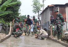 Fisik tambahan pengecoran Badan Jalan di RT 12 LK I Kelurahan garuntang Kodim 0410/KBL