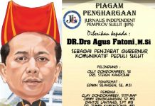 Pjs Gubernur Agus Fatoni Terima Penghargaan Penjabat Gubernur Komunikatif dan Peduli Sulut dari JIPS