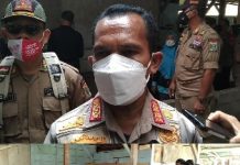 Pembongkaran Lapo Tuak Pasar 24 Tejoagung oleh SAT POL.PP Kota Metro