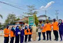 Bersama BPBD, Puskesmas Sidomulyo Mesuji Bagikan Masker ke Warga Cegah Ispa