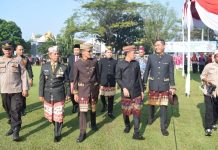 Wakili Dandim, Danramil 412-08/Abung Timur Hadiri Upacara HARGANAS ke-33 Tahun 2026 Bertema “Ayah Wajib Hadir”