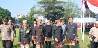 Wakili Dandim, Danramil 412-08/Abung Timur Hadiri Upacara HARGANAS ke-33 Tahun 2026 Bertema “Ayah Wajib Hadir”