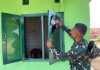 Penyelesaian Akhir RTLH TMMD Ke-129, anggota Satgas Bersihkan dan Rapikan Rumah Milik Sandri